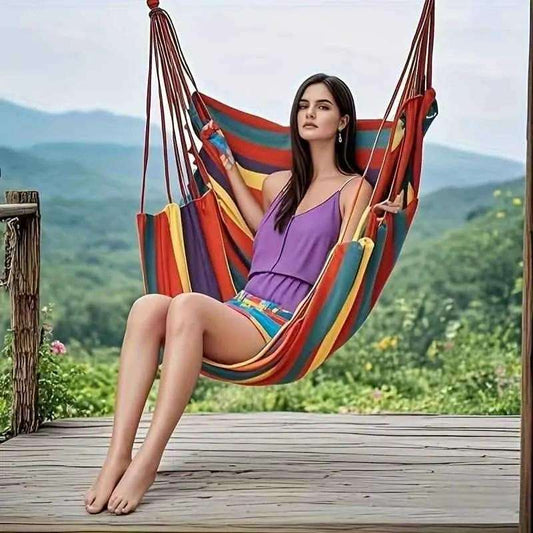 Multicolor striped canvas hammock chair with red suspension ropes and seat hammock