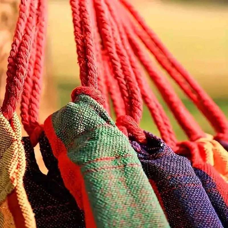 Braided red suspension rope with multicolor hammock fabric edge