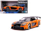Orange and black die-cast RX-7 RHD model car, front three-quarter view