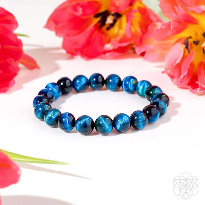 Blue beaded bracelet with evenly spaced round beads