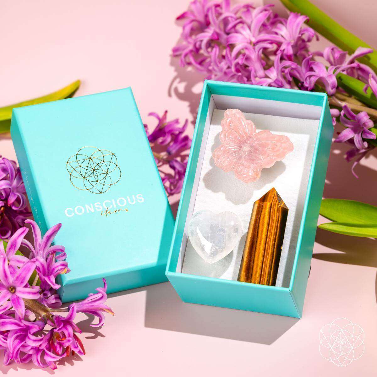Car crystal safety kit in turquoise box with tiger-eye pyramid, heart and butterfly crystals