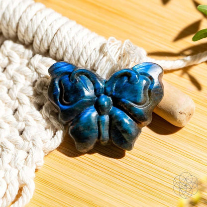 Blue labradorite butterfly carving on knotted cream macrame cord