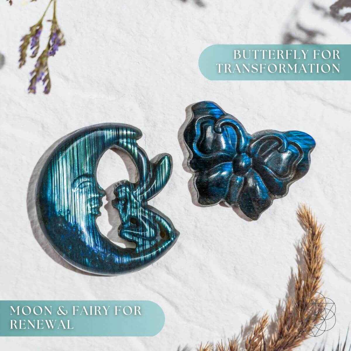 Blue labradorite moon and butterfly carvings on a light fabric surface