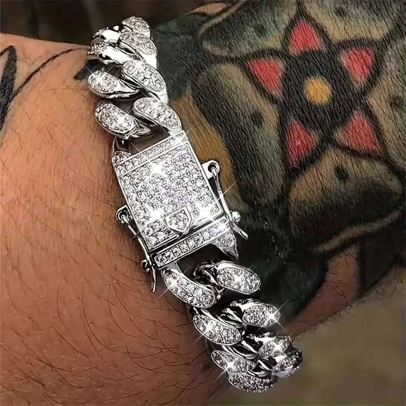 Silver-tone Cuban link zircon bracelet with rectangular center plaque and chain link stones