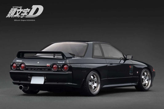 Black die-cast Skyline GT-R R32 model, rear three-quarter view with twin tail lights