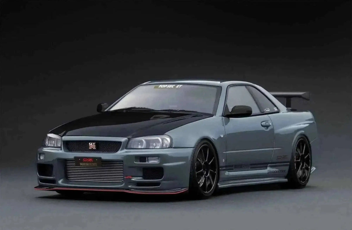 Ignition-Model Nissan Skyline GT-R R34 (BNR34) Top Secret 34GT-R RHD Stealth Grey w/ Carbon Fiber Hood 1:18 Cartsfy Inc.