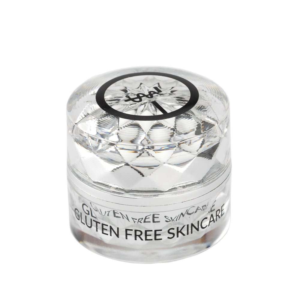 Eye cream jar with faceted clear texture and “GLUTEN FREE SKINCARE” label