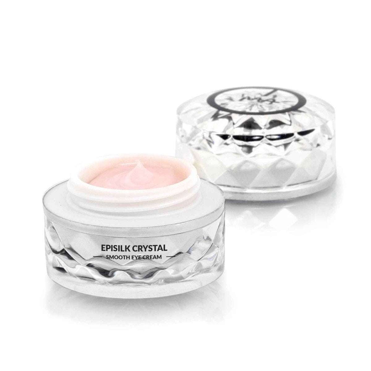 Eye cream jar with faceted clear container and pink cream inside, white lid top