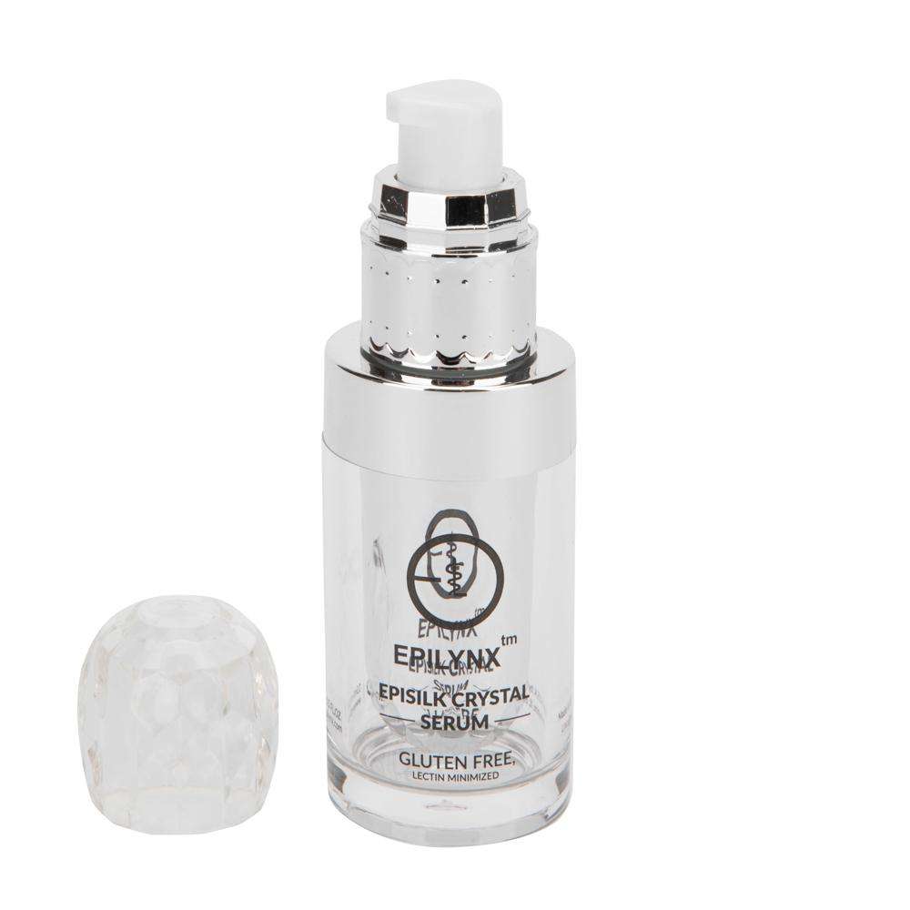 Face serum bottle with white cap and small light cream jar
