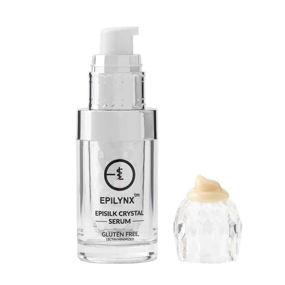 Intense brightening face serum bottle with white cap and small cream sample