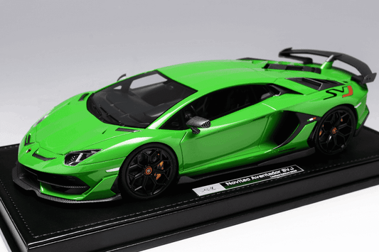Green 1:18 die-cast Lamborghini Aventador SVJ model on display base