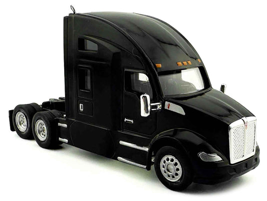 Black Kenworth T680 sleeper cab HO model truck, front three-quarter view