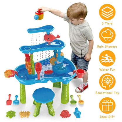 Kids water and sand play table with blue basin, red dolphin sprayer, and water cups