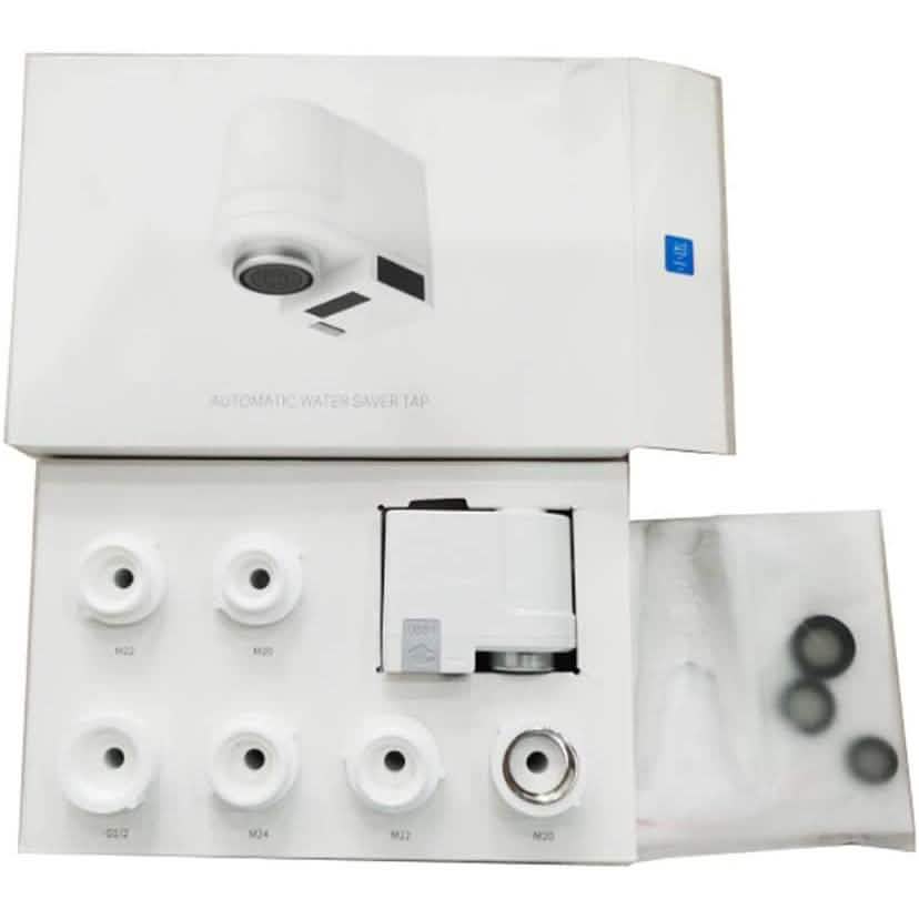 Automatic sensor faucet installation kit with control module and assorted fittings tray