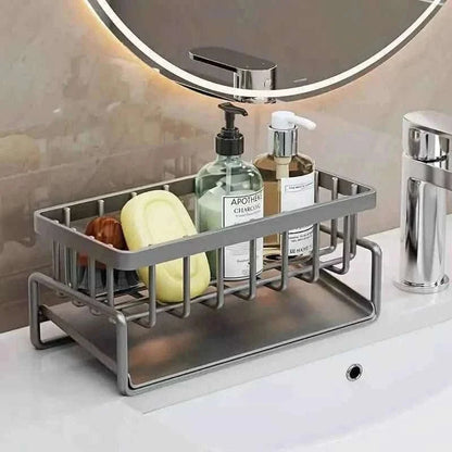 Gray sink dish rack organizer with bottle slots, soap dispenser, and sponge trays