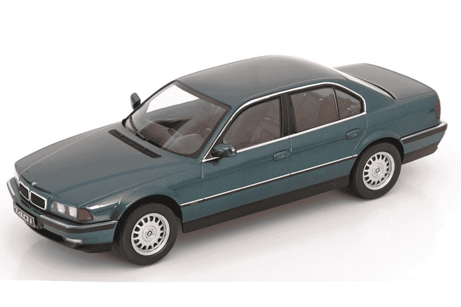 Green metallic 1994 sedan die-cast model with front-left side view and chrome wheels