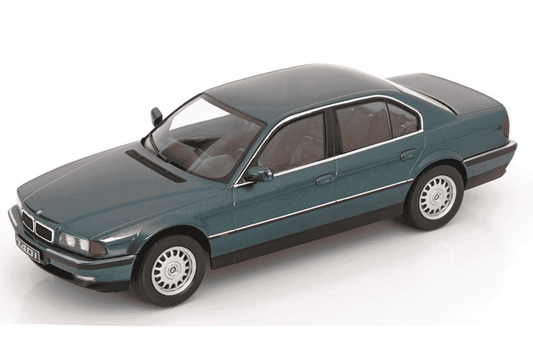 Green metallic 1994 sedan die-cast model with front-left side view and chrome wheels