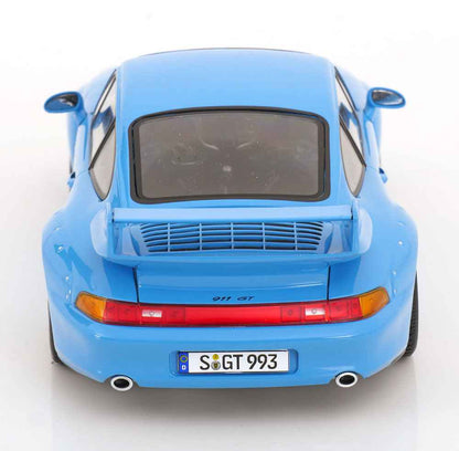 Blue 1:18 scale Porsche GT2 model car rear view with red taillights and vents