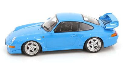 Blue 1:18 scale Porsche GT2 model car in three-quarter view with rear spoiler