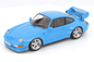 Blue 1:18 scale Porsche GT2 model car with open hood and white wheels