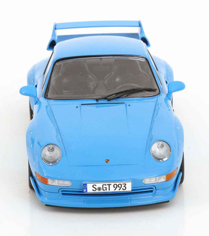 Blue 1:18 scale Porsche GT2 model car front view with headlights and grille