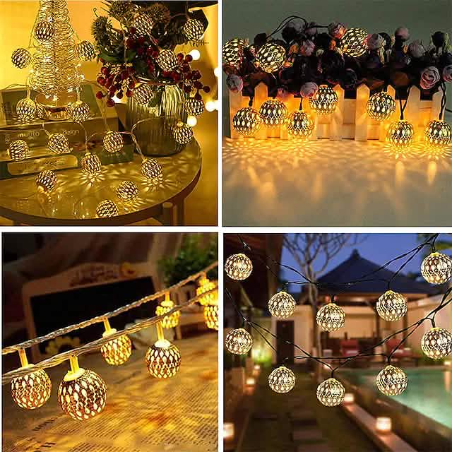 LED solar string lights with warm white globe bulbs arranged on outdoor surfaces