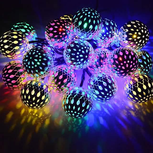 LED solar string lights with multicolor RGB globe bulbs on a wire strand