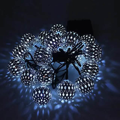 LED solar string lights with cool white globe bulbs on a connected wire strand