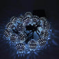 LED solar string lights with cool white globe bulbs on a connected wire strand