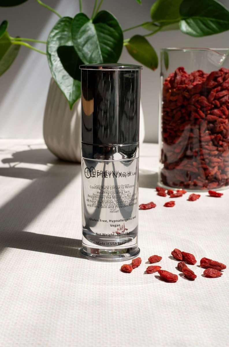 Moisturizer bottle with silver pump dispenser on a surface