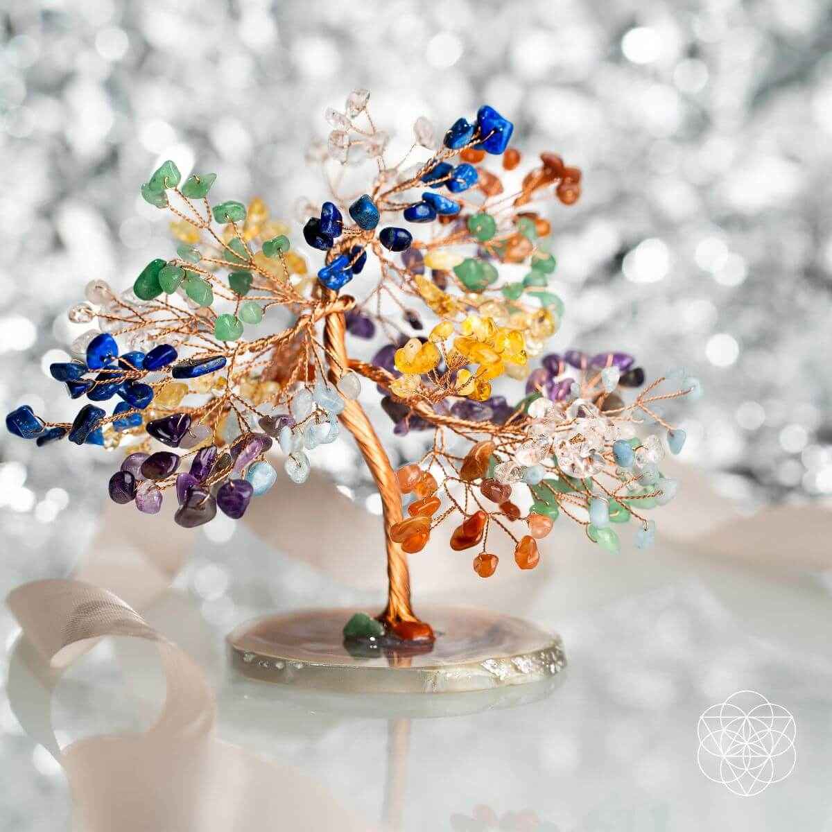 Crystal chakra tree figurine with copper trunk, multicolor gem branches, on round base
