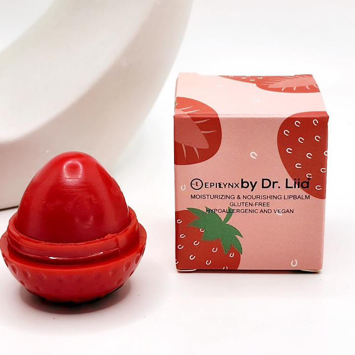 Red strawberry-shaped lip butter balm and product box