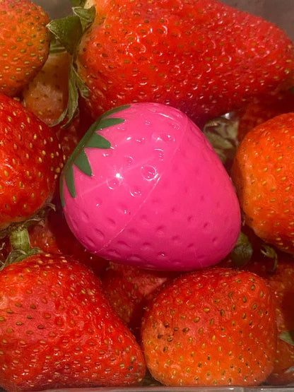 Pink strawberry-shaped lip butter balm container