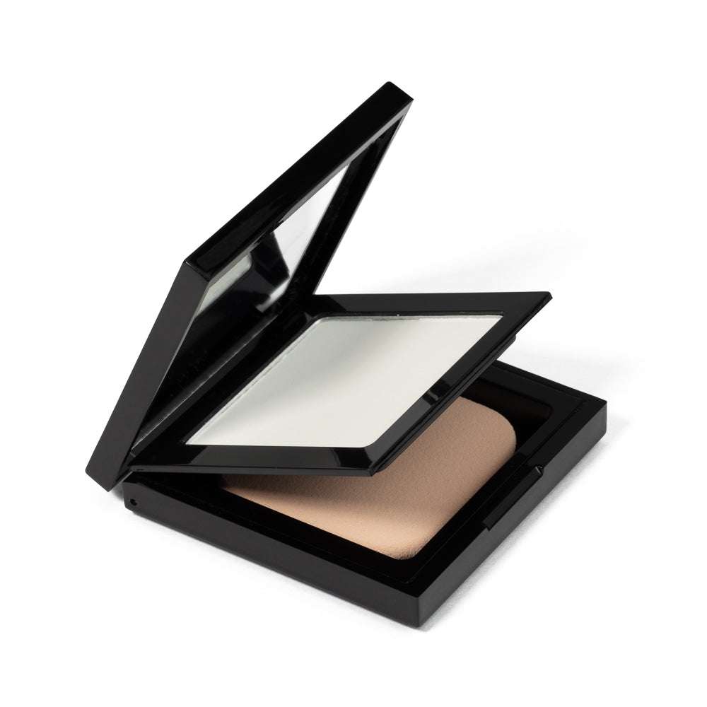 Matte powder foundation compact, open lid, beige-toned powder in black case