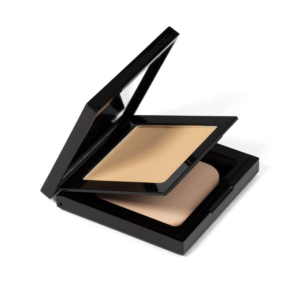 Luminous Matte Powder Foundation compact, open lid showing beige matte powder pan