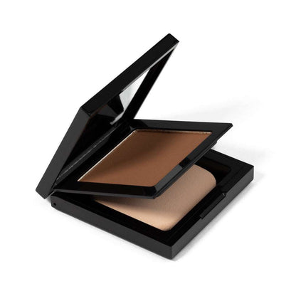 Matte powder foundation compact, open black case with darker warm brown powder block