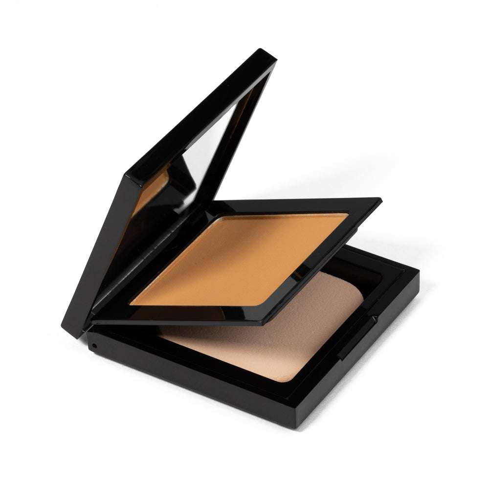 Matte powder foundation compact with open lid and warm tan square refill pan
