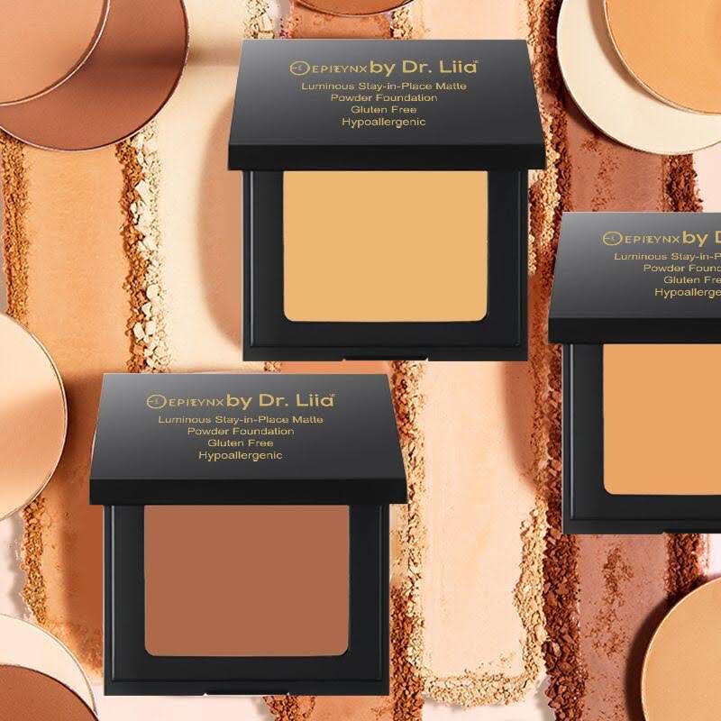 Matte powder foundation compacts with tan and brown powder shades in black cases