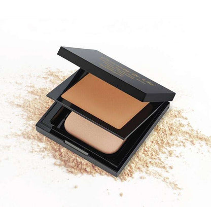 Matte powder foundation compact, open black case with medium peach-tan powder block