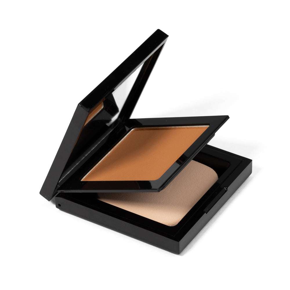 Matte powder foundation compact, open black case with warm bronze powder block