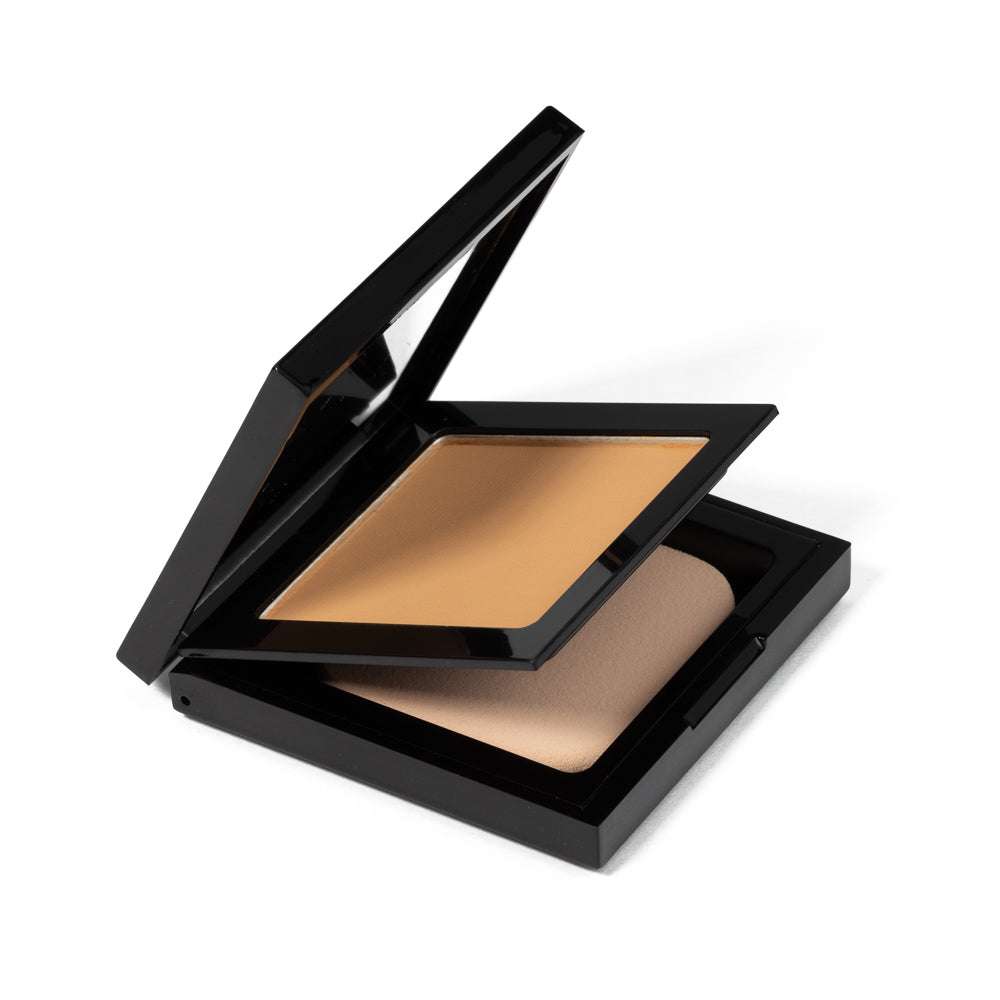 Luminous Matte Powder Foundation compact with powder applicator and beige powder