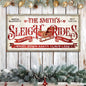 Framed Christmas wall sign with red sleigh ride lettering and vintage ornaments
