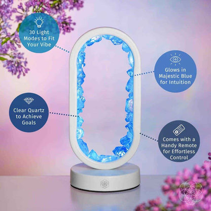 Clear quartz achievement lamp with glowing blue oval frame on white stand