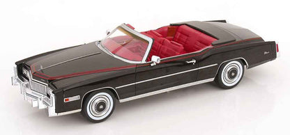 Black convertible model car with red interior, white pinstripe, angled side view, 1:18 scale
