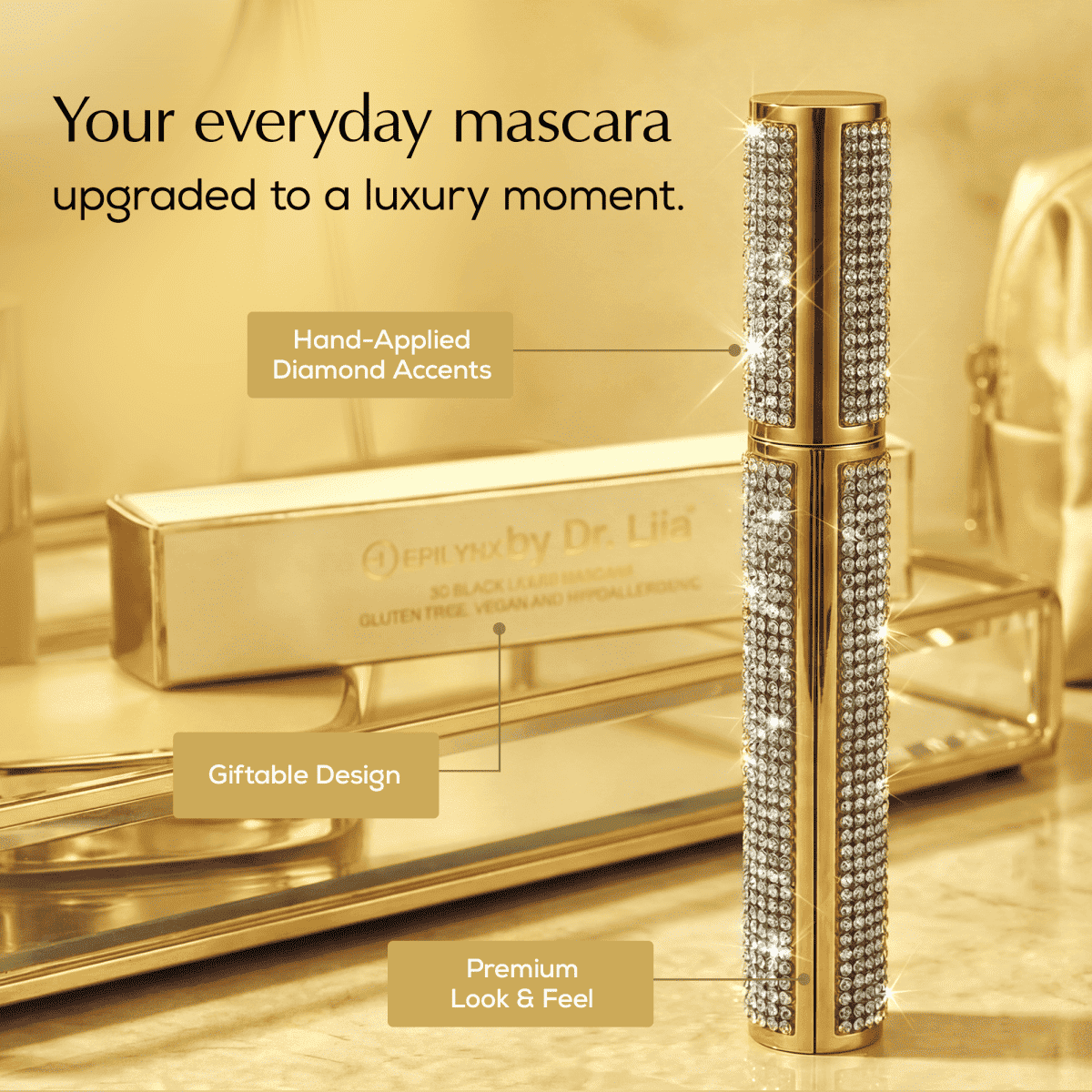 Rhinestone mascara tube with gold bottle body