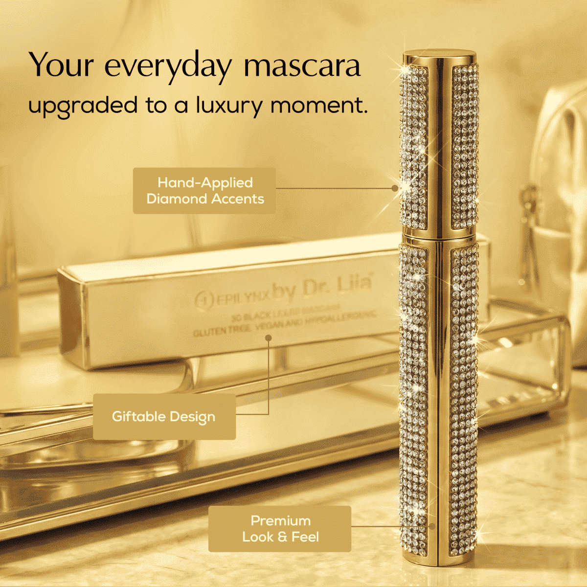 Rhinestone mascara tube with gold bottle body