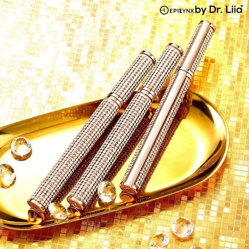 Diamond rhinestone mascara tubes with wand caps and golden eyelash finish