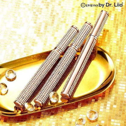 Diamond rhinestone mascara tubes with wand caps and golden eyelash finish