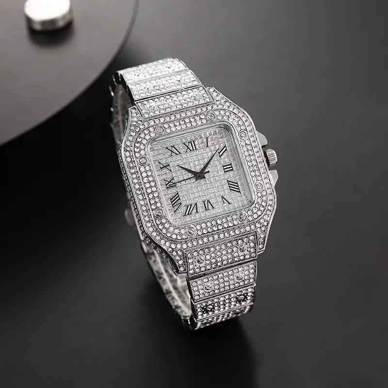 Silver rhinestone analog watch with Roman numerals, rectangular case, link bracelet