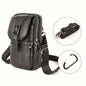 Black leather waist bag with front buckle flap, zippered front pockets, and shoulder strap